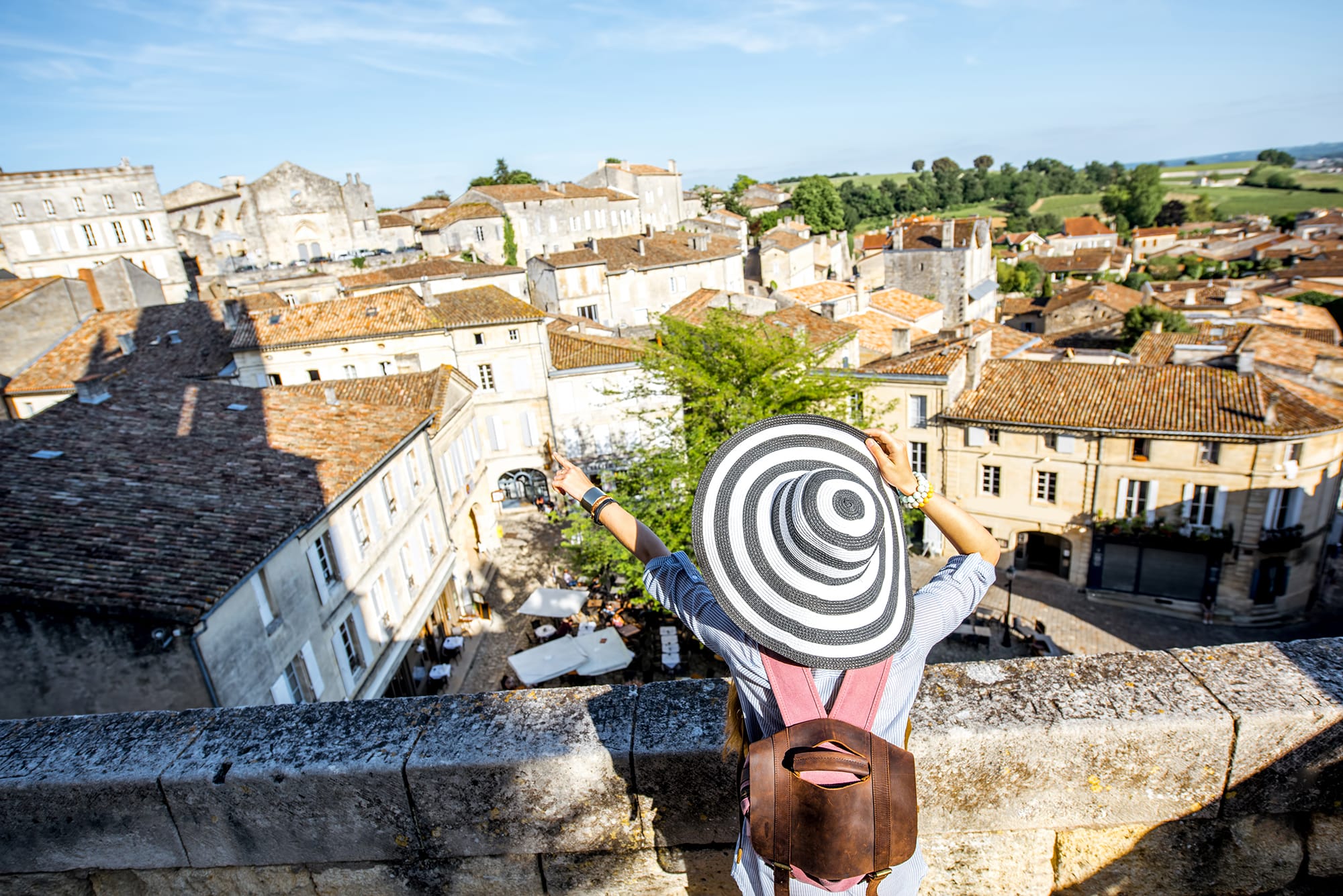 Woman tarveling in Saint Emilion village, France